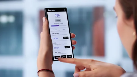 Person Using A Loyalty App On Phone Stock Footage 333399740