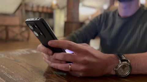 Person Using a Mobile Phone Stock Footage 297730800