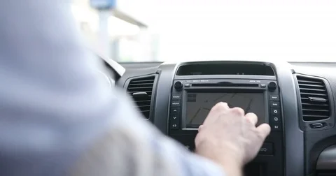 Person using navigation gps in car to travel to destination Stock Footage