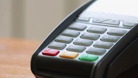 Person using NFC technology on smart phone to pay Stock Footage 79901355