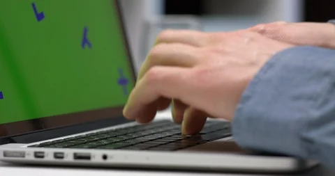 A Person Using The Notebook Laptop With Green Screen For Chroma Key Stock Footage 104743225