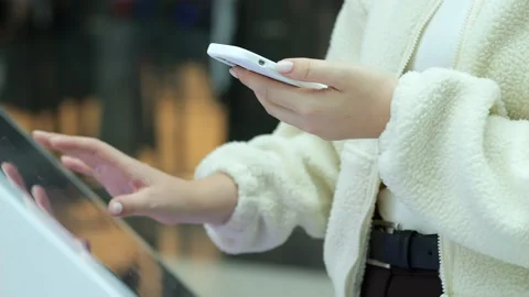 Person using phone and touching screen with other hand Stock Footage 347662953