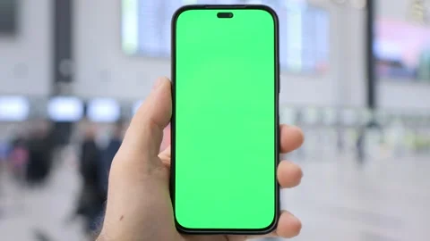 Person using phone in public space Stock Footage 343843800