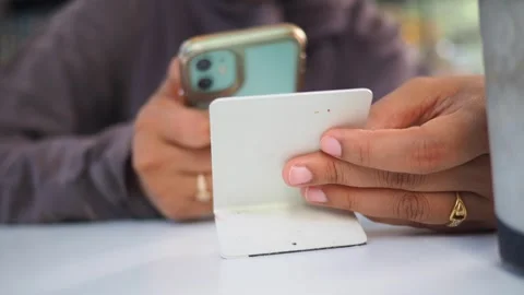 Person using phone while scan the QR code to find the menu Stock Footage 324772119