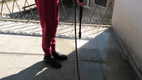 Person using pressure washer cleaning balcony floor Stock Footage 344531133