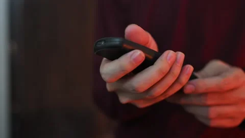 Person Using Remote Control to Operate Electronic Device 動画素材 337847582