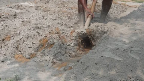 Person Using Shovel Stock Footage 336685141
