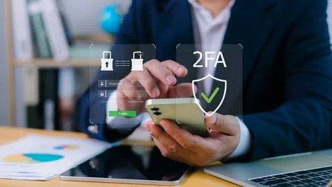 Person using smartphone to access digital interface with 2FA login screen a.. Stock Photos