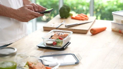 Person using smartphone app for calorie Stock Footage 314947501