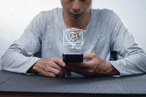 Person Using Smartphone with Digital Analytics and Data Visualization Stock Photos