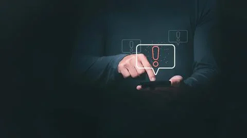 Person using smartphone with digital icons in dark setting Stock Photos