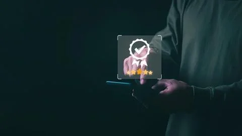 Person using smartphone with digital security icon Stock Photos