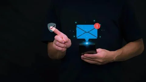 Person using smartphone with email notification and checkmark Stock Photos