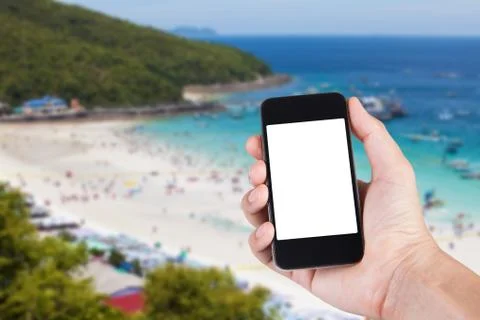 Person using smartphone white screen holder on hand with blurry background of Stock Photos