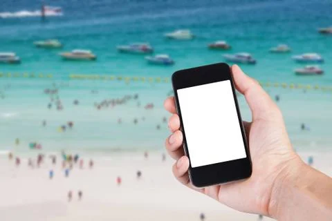 Person using smartphone white screen holder on hand with blurry background of Stock Photos