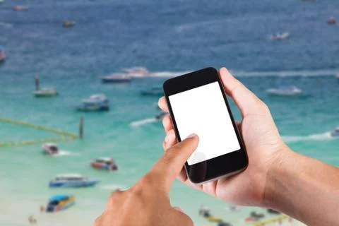 Person using smartphone white screen holder on hand with blurry background of Stock Photos