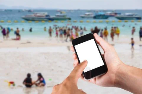 Person using smartphone white screen holder on hand with blurry background of Stock Photos