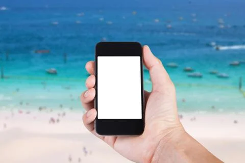 Person using smartphone white screen holder on hand with blurry background of Stock Photos