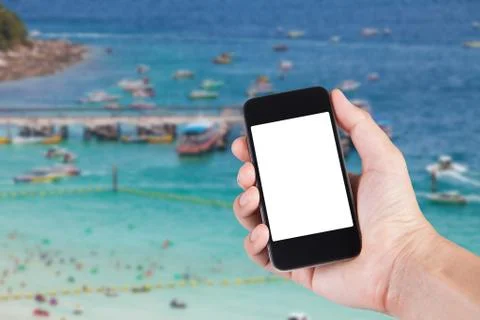 Person using smartphone white screen holder on hand with blurry background of Stock Photos