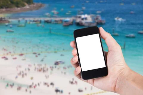 Person using smartphone white screen holder on hand with blurry background of Stock Photos