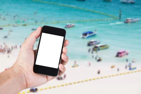 Person using smartphone white screen holder on hand with blurry background of Stock Photos