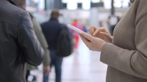 Person using tablet in airport or station Stock Footage 342065355