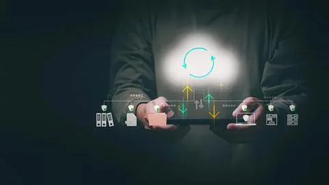 Person using tablet with digital icons and graphics Stock Photos