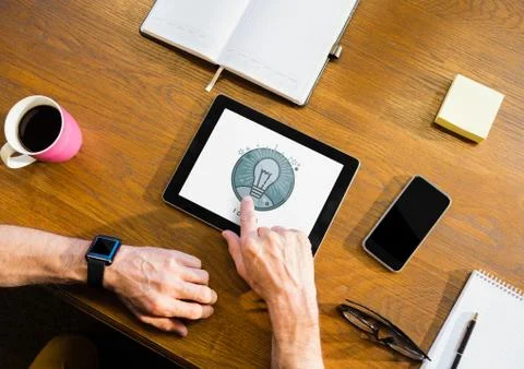 Person using a tablet with education icon on the screen Stock Photos