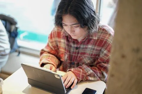 Person using tablet from elevated angle Stock Photos