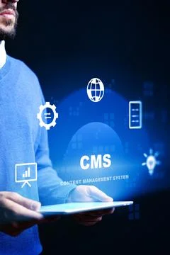 Person using a tablet to interact with content management system graphics i.. Stock Photos