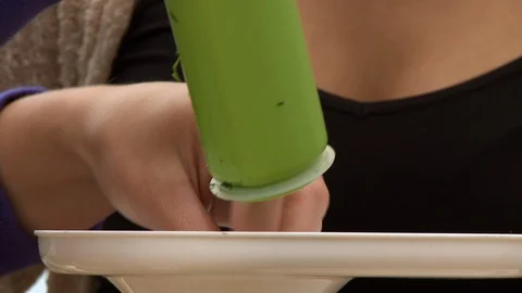 Person Using Tamper Stick In Blender Stock Footage 115805355
