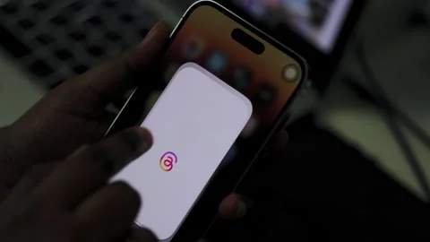 Person using Threads on a Smartphone. Finger Scrolling Social Media App Feed. Stock Footage 245426368