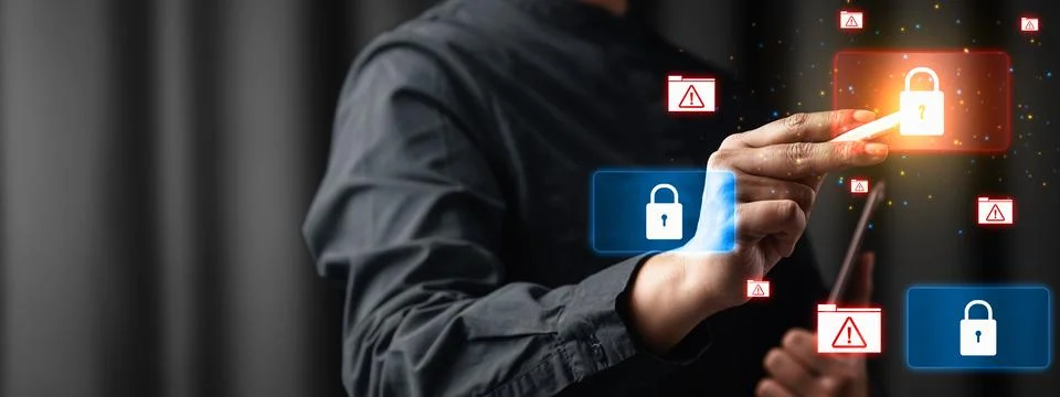 Person using a touchscreen to secure their online data with lock protection.. Stock Photos