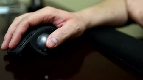 Person using trackball Stock Footage 140057275