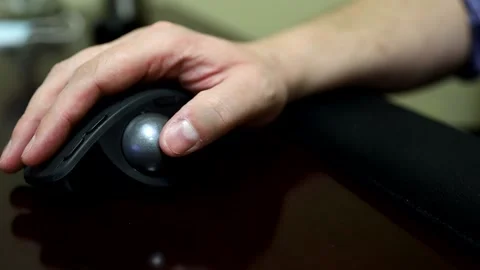 Person using trackball Stock Footage 140057277