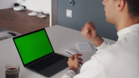 Person Using Video Conferencing technology from home for video call green screen Stock Footage 138905281