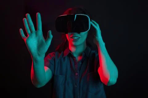 Person using virtual reality headset waving hand Stock Photos