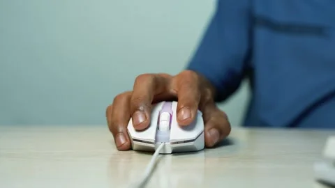Person Using Wired Computer Mouse at Desk, Close-up of a person using a wir.. 스톡 동영상 346484030