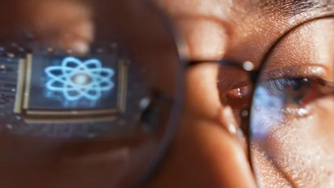 A person viewing a screen reflecting a digital quantum computing chip. Stock Footage 324839466
