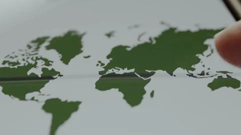 Person views a minimalistic World map on a digital device Stock Footage 329748549