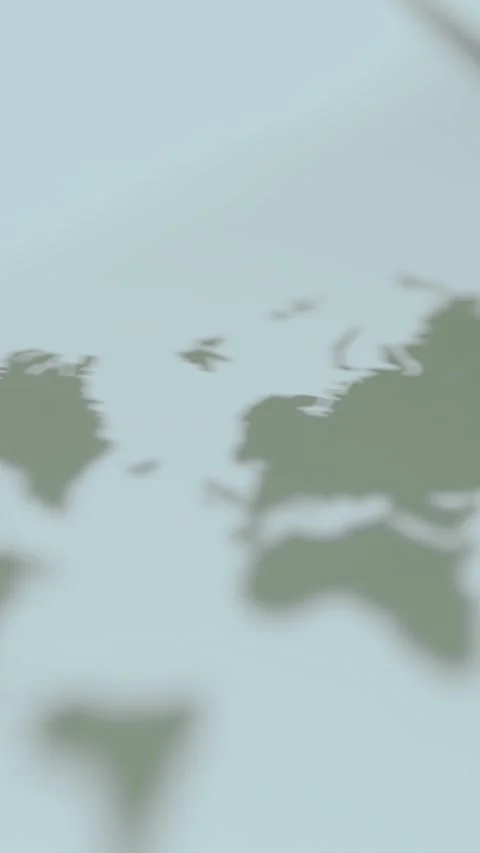 Person views the world map with a minimalistic representation Stock Footage 329750234