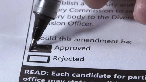 Person Voting And Approving Amendment On Ballot Stock Footage 242104451