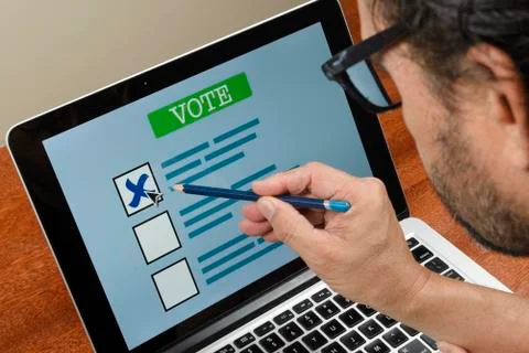 Person voting on the computer Stock Photos