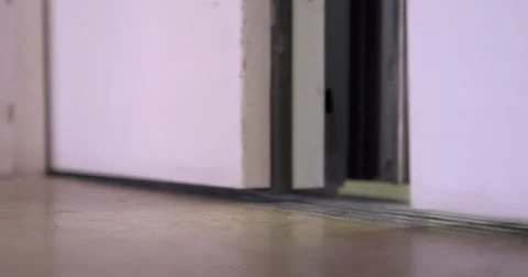 Person walking in and out of elevator that opens then closes 4k 스톡 동영상 51685963