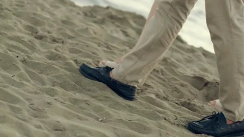 Person walking on the beach Stock Footage 219614708