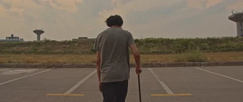 Person walking with the help of a stick Stock Footage 137381233
