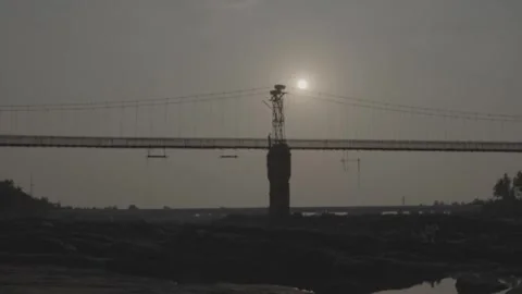 Person walking on Old Bridge in India Stock Footage 272465724