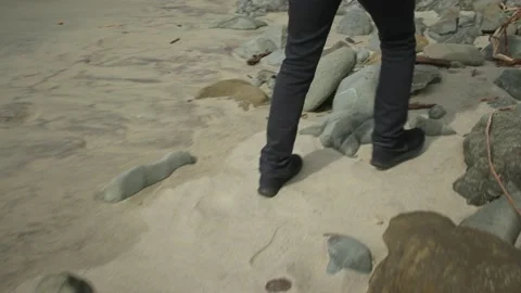 Person walking on the sand at the beach. Stock Footage 150239585