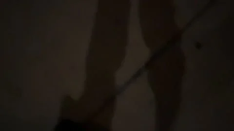 Person walking with shadows at night Stock Footage 277679211