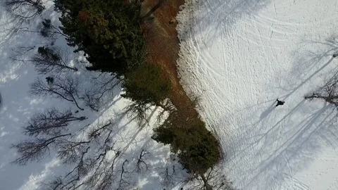 A person walking in the snow  Vídeo Stock 76212894